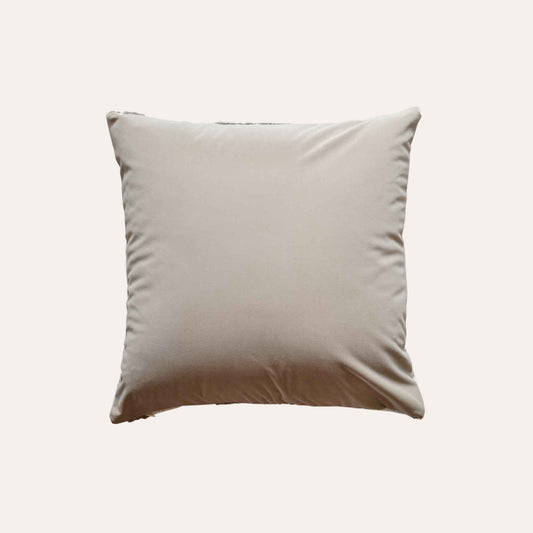 Trendy cushion cover with a chic geometric pattern in soft beige and white tones with beige back.
