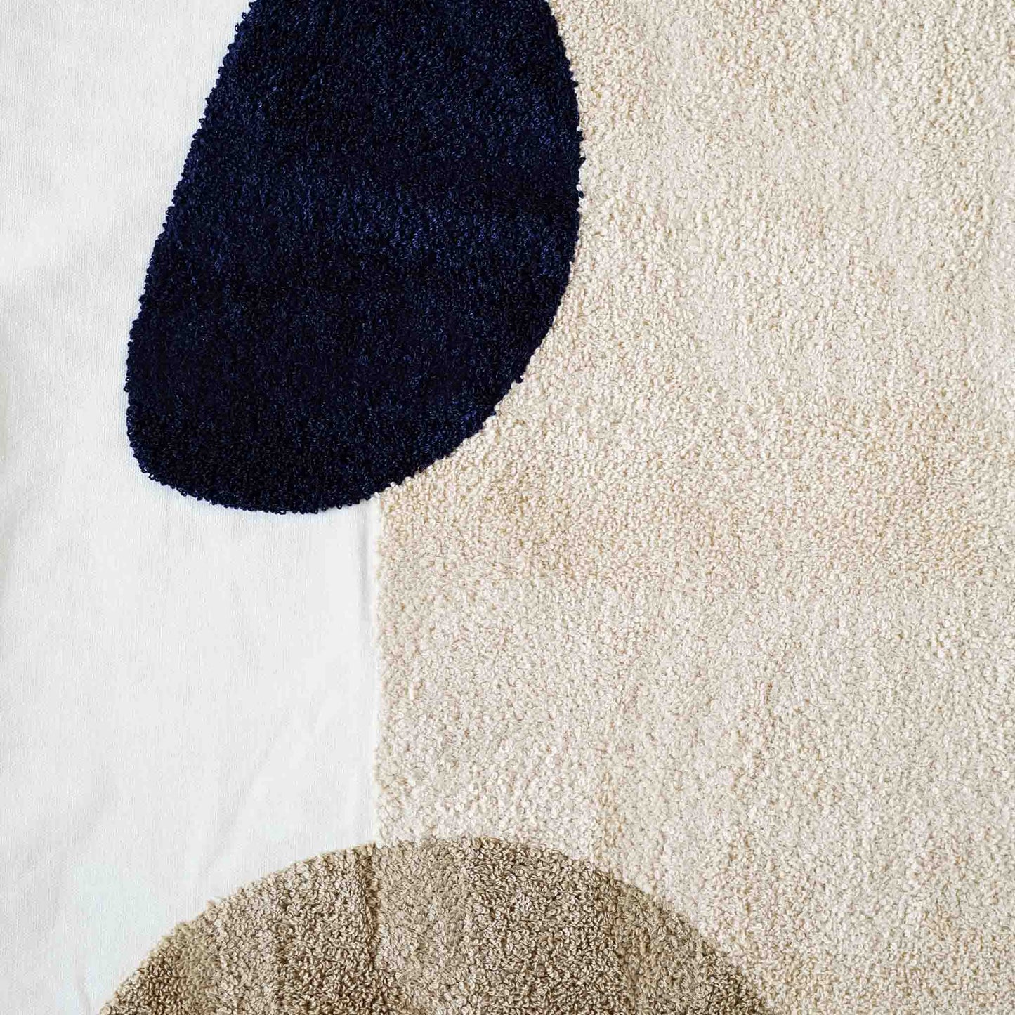 This decorative cushion features a stylish black beige tufted design that adds a modern touch to any space.