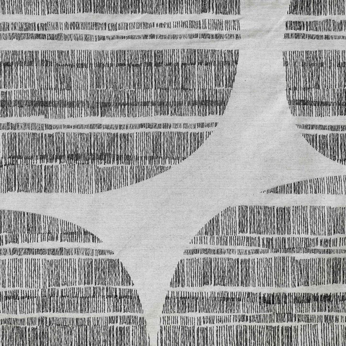 Featuring a stylish grey and black pattern, this decorative lumbar cushion adds a contemporary touch to home décor.