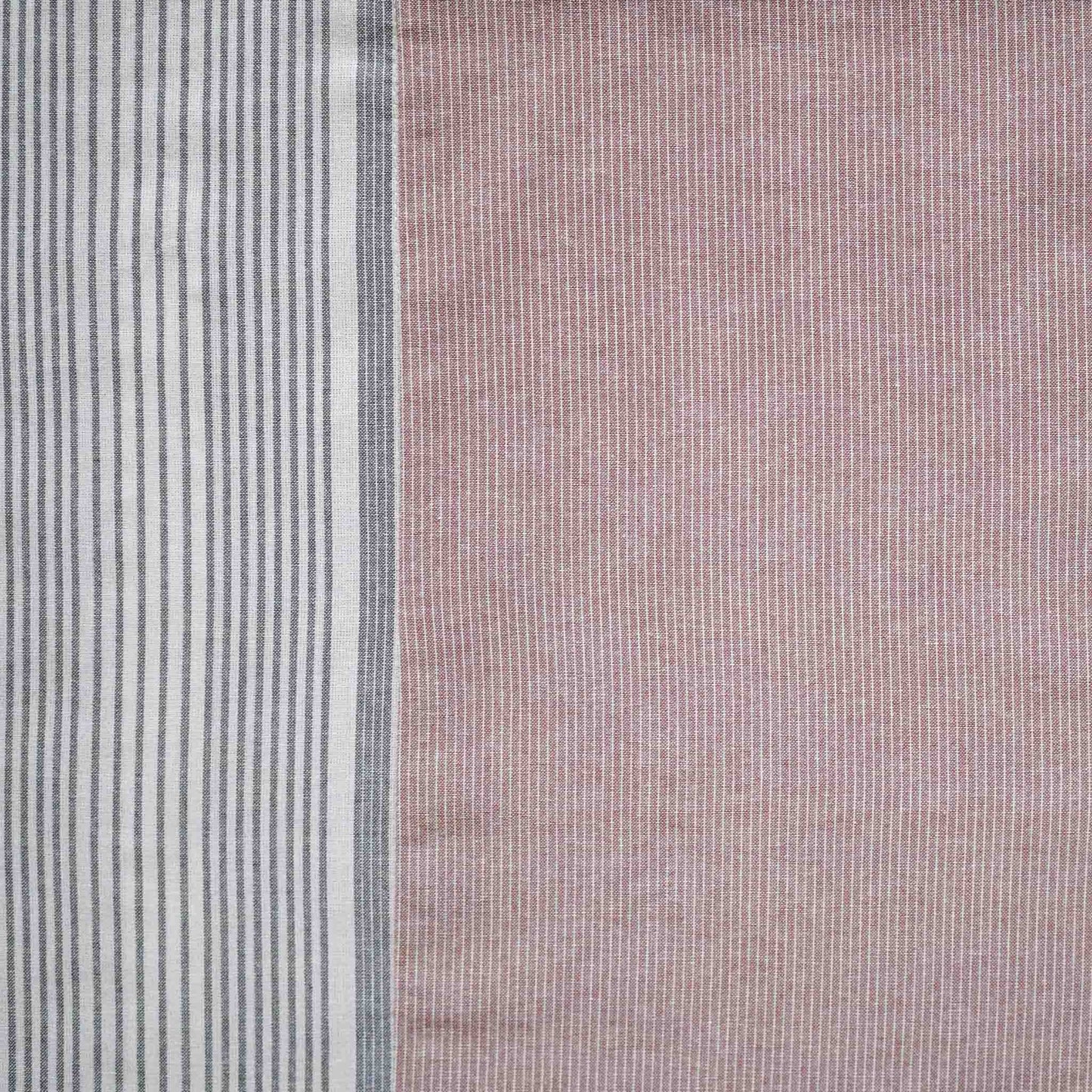 The coral red, white and grey stripe asymmetric cushion.