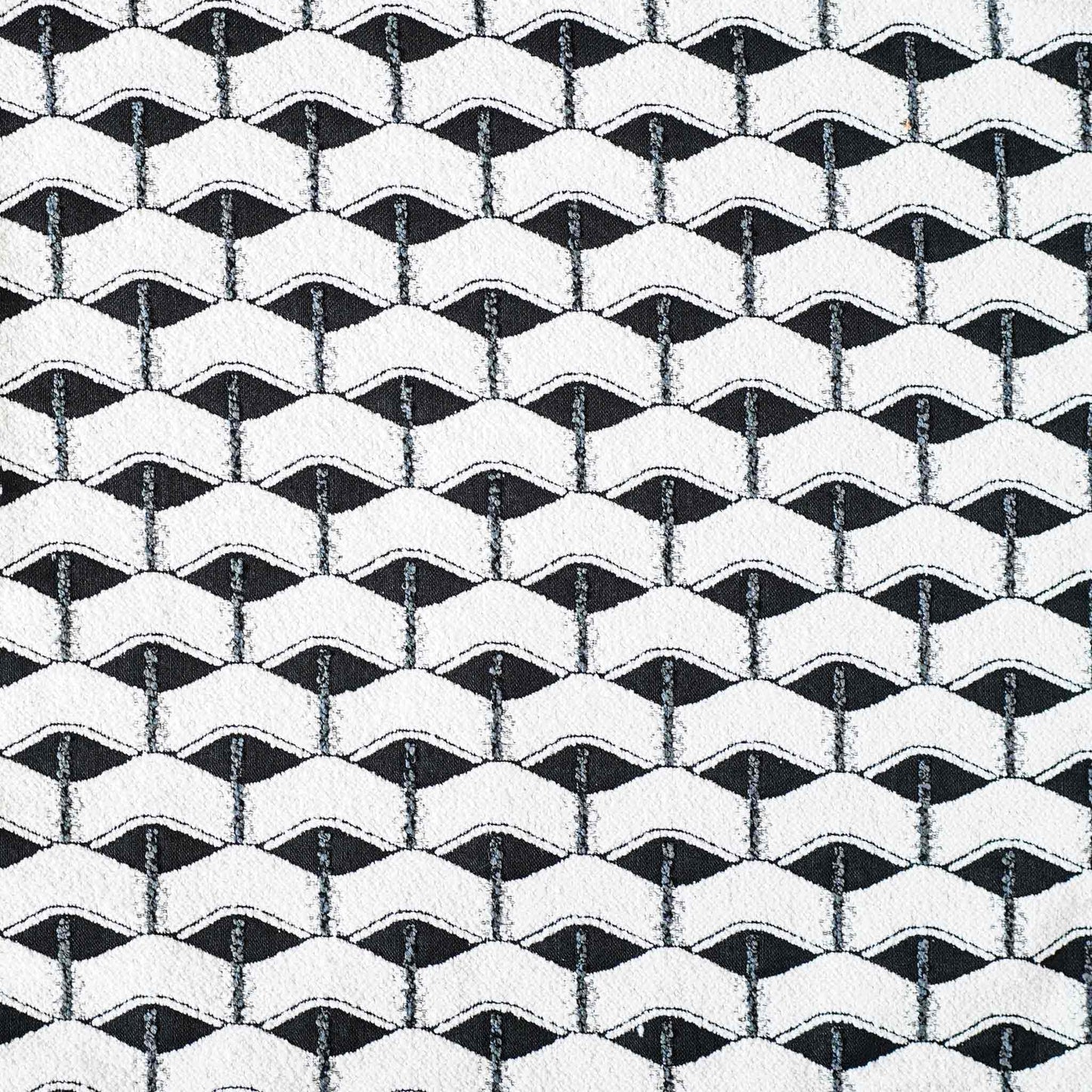 Chic black and white geometric cushion cover.