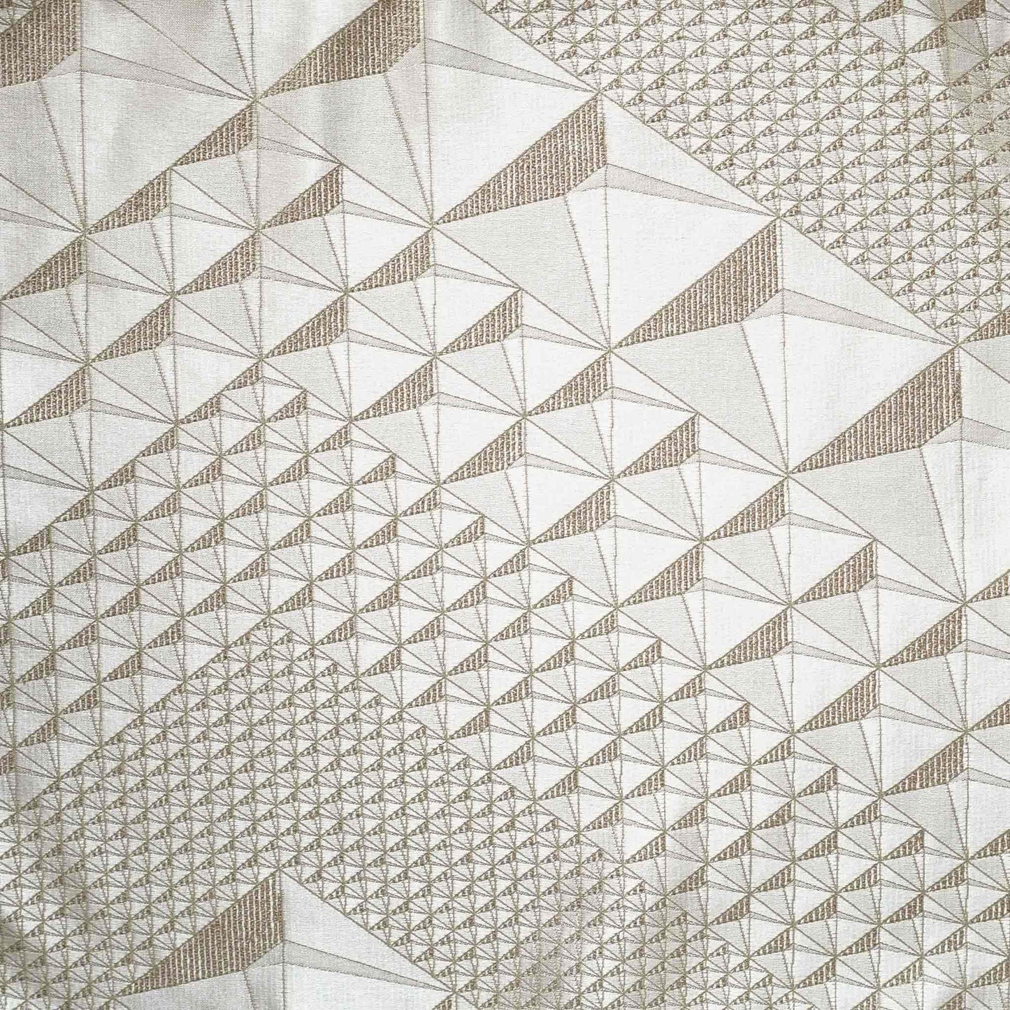 Exquisite geometric jacquard cushion covers in gold and champagne.