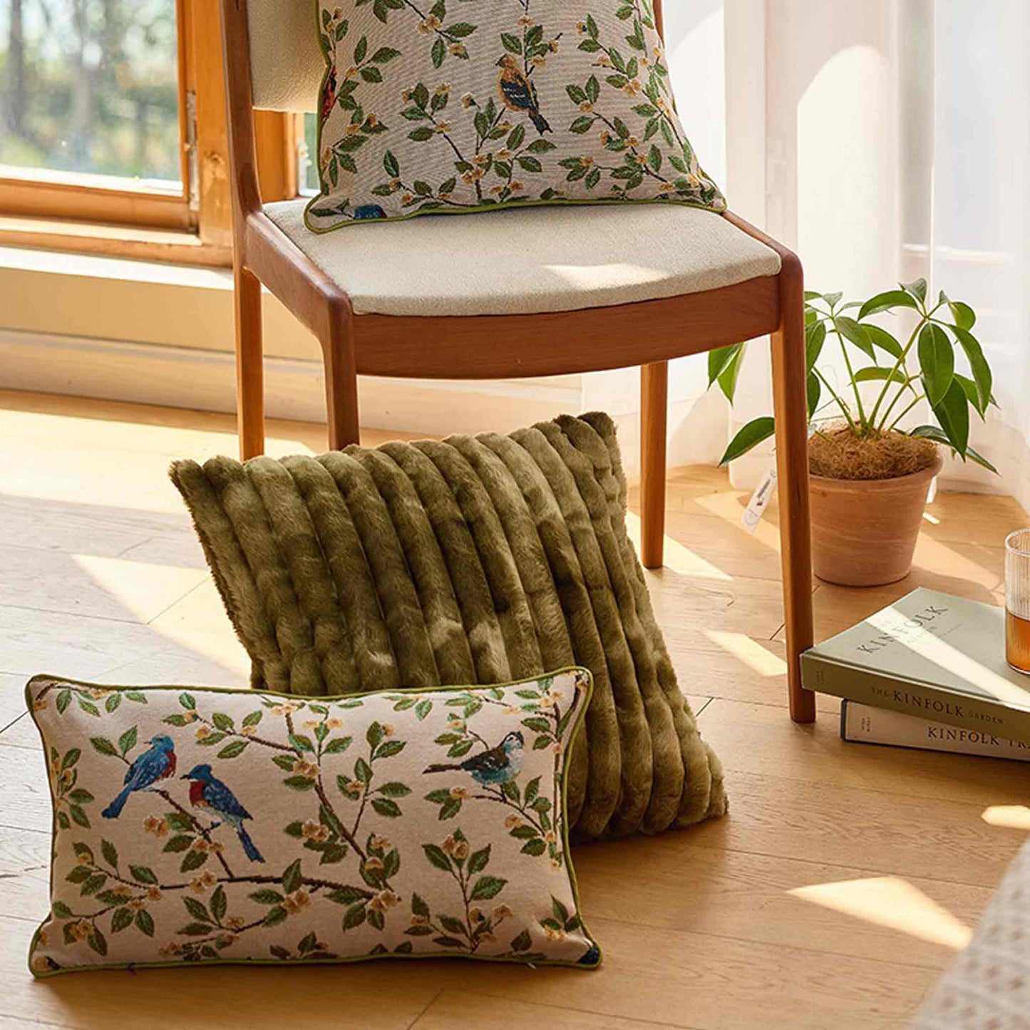A stylish lumbar cushion cover adorned with retro birds on branches.