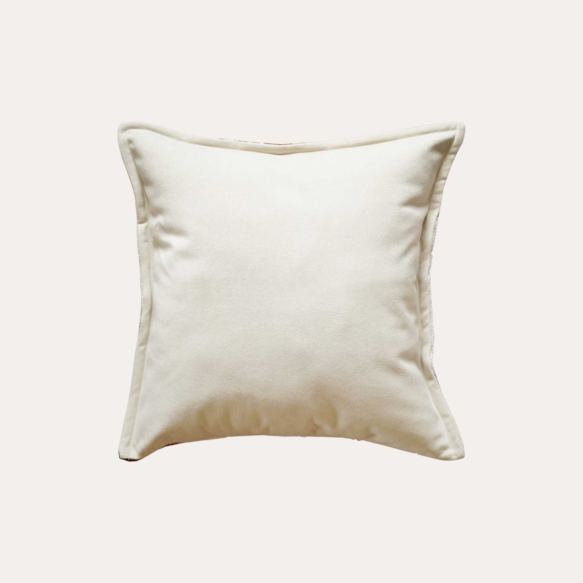 An attractive decor cushion cover adorned with red and white abstract floral with white back.