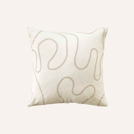 Ball stitch white background decorative cushion.