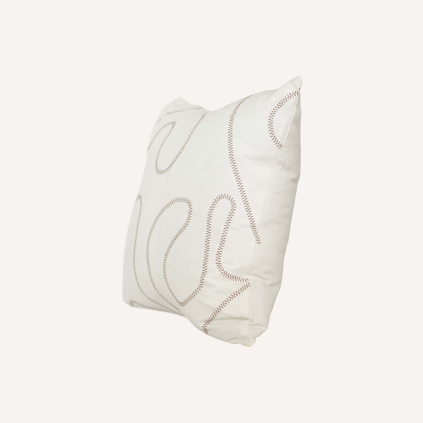 Ball stitch white background decorative cushion.