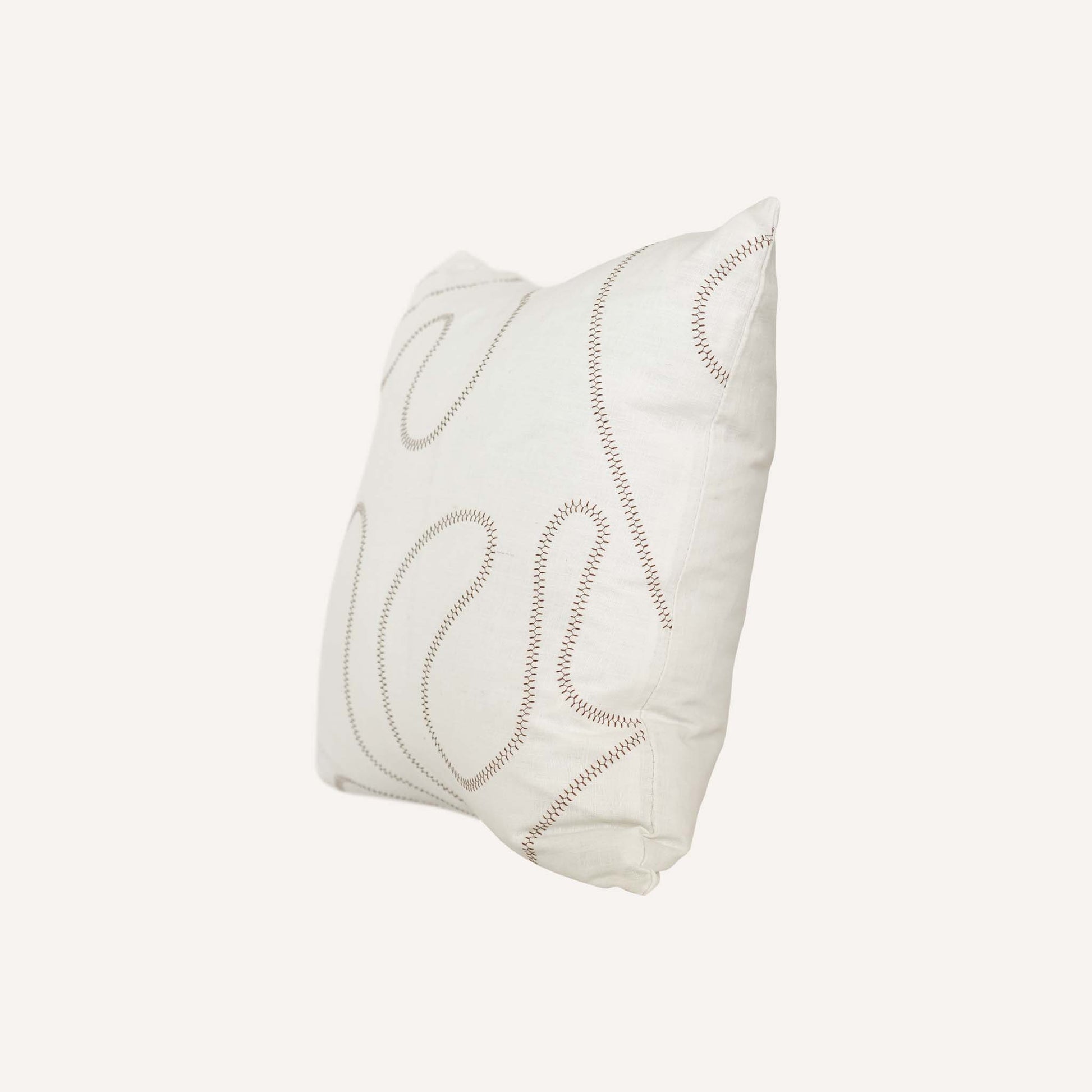 Ball stitch white background decorative cushion.