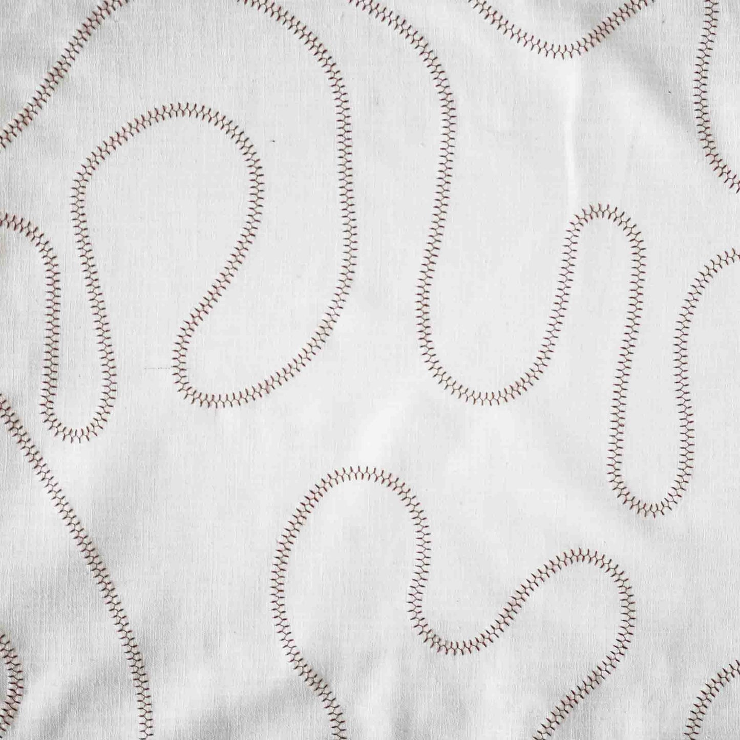 Ball stitch white background decorative cushion.