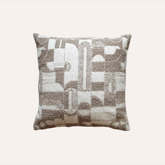 Trendy cushion cover with a chic geometric pattern in soft beige and white tones.