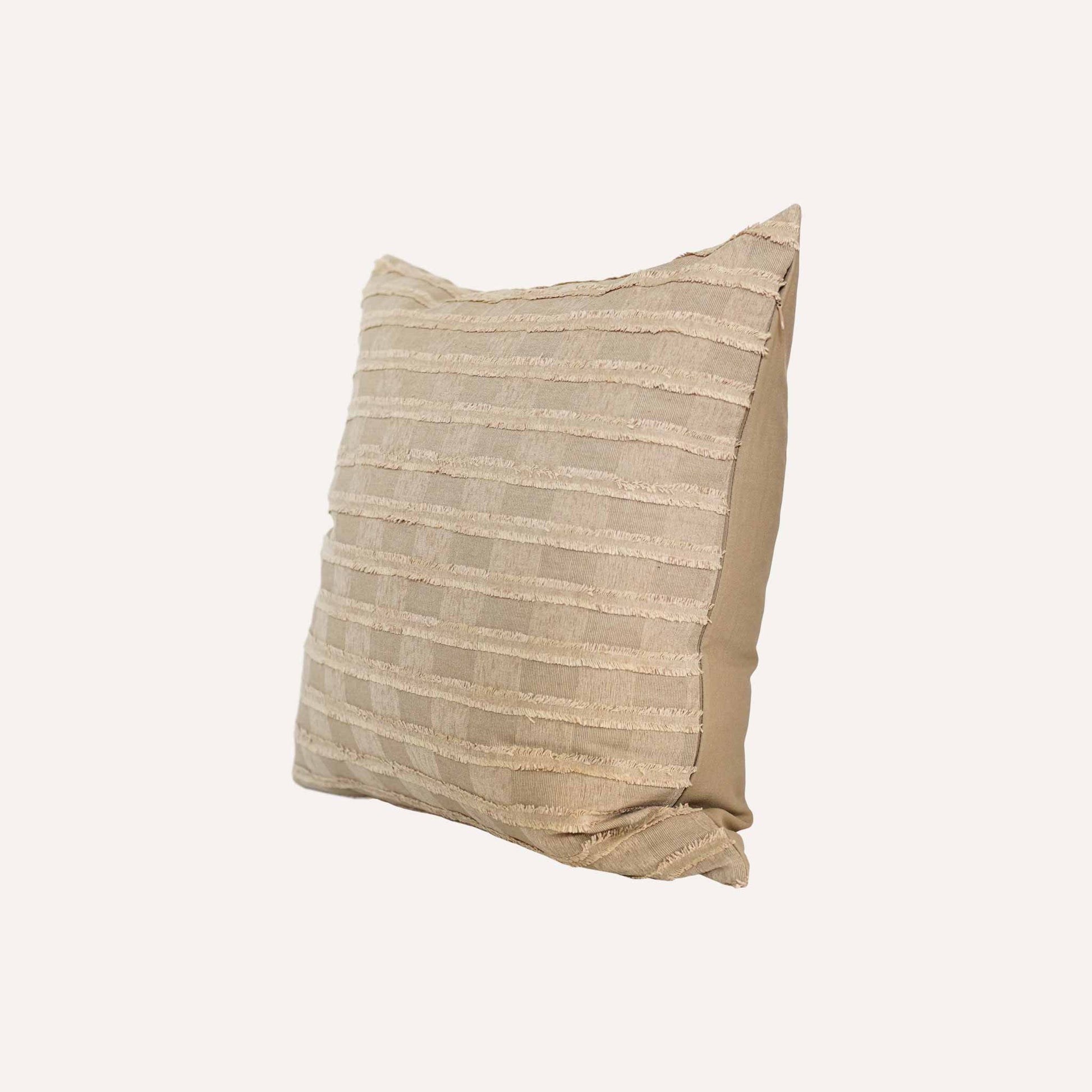 Square pattern cushion with textured design in earthy colour.