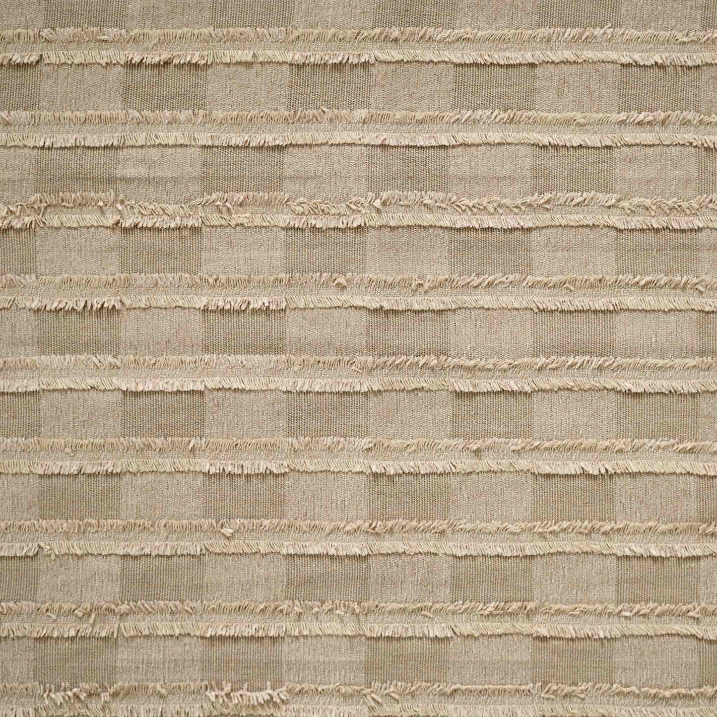 Square pattern cushion with textured design in earthy colour.