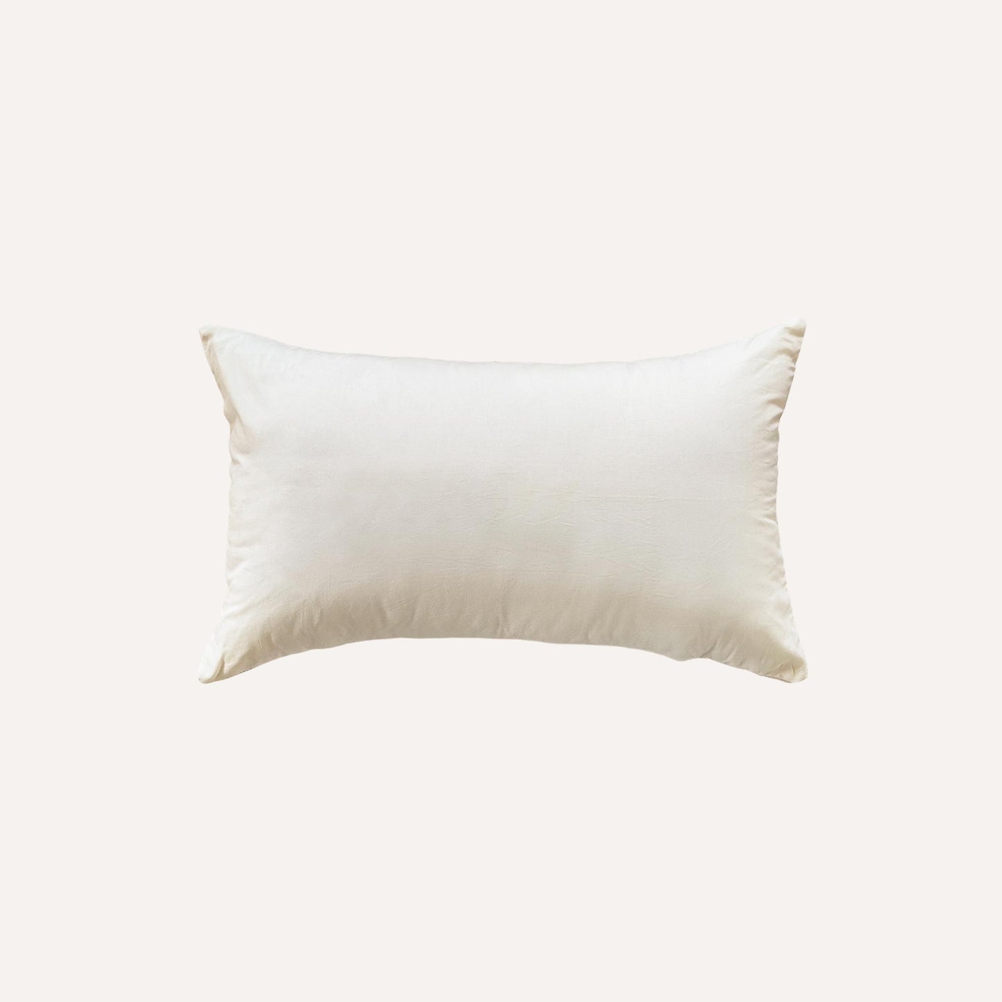 Solid beige lumbar cushion back.