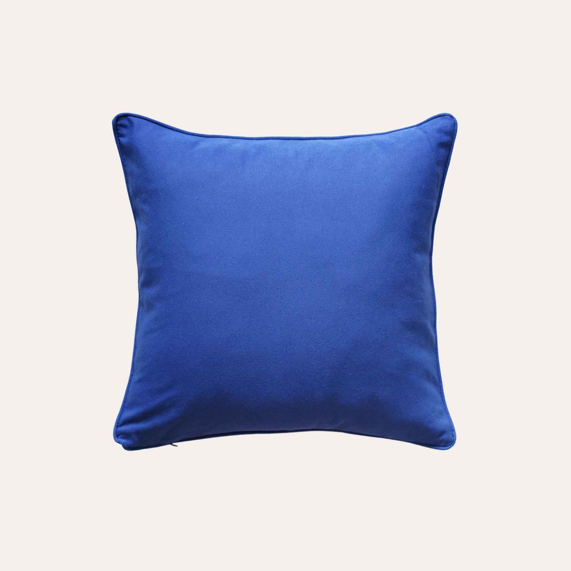 Bird and floral jacquard on white and blue cushion with solid blue back.