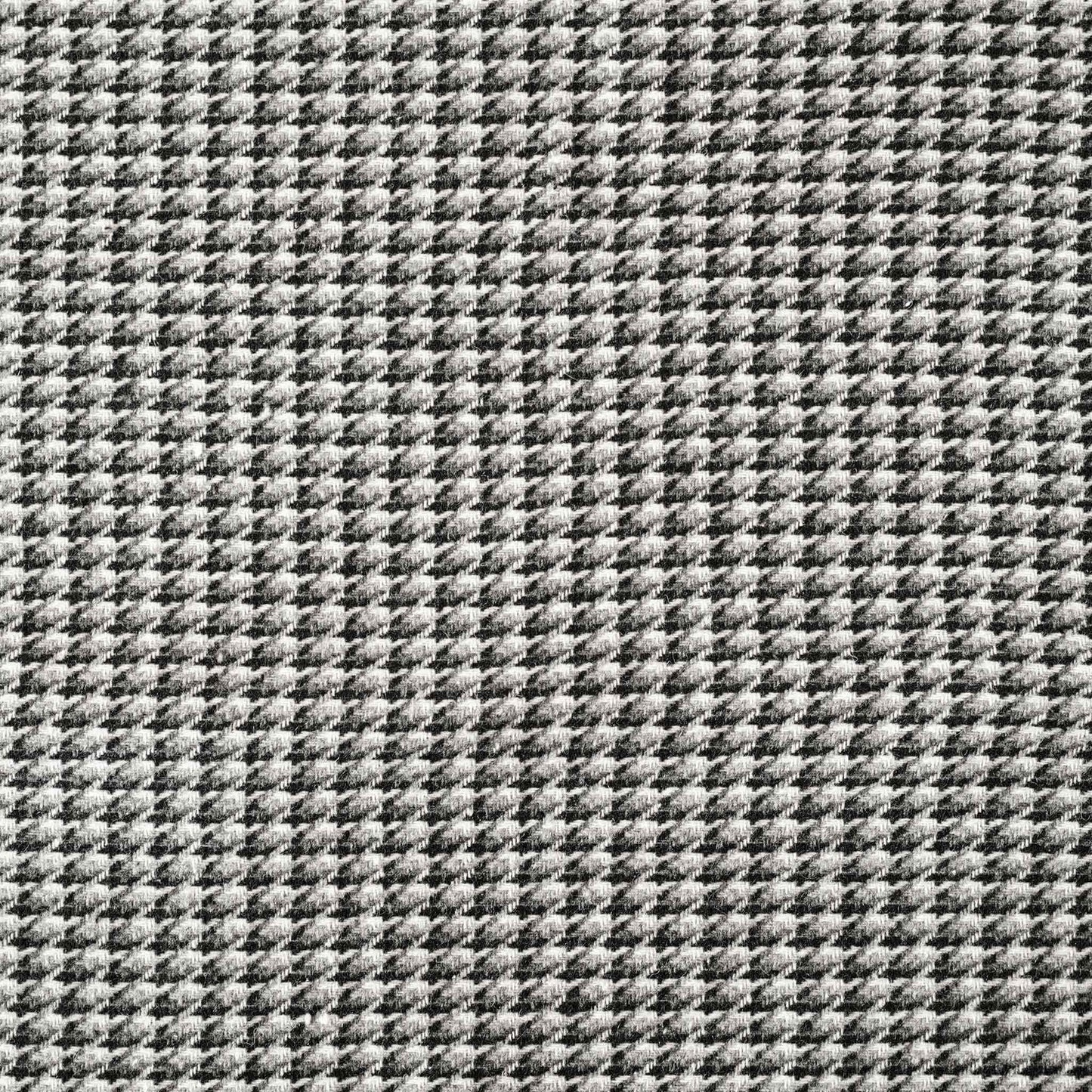 A black and grey checkered cushion cover featuring a houndstooth pattern with wide edges.