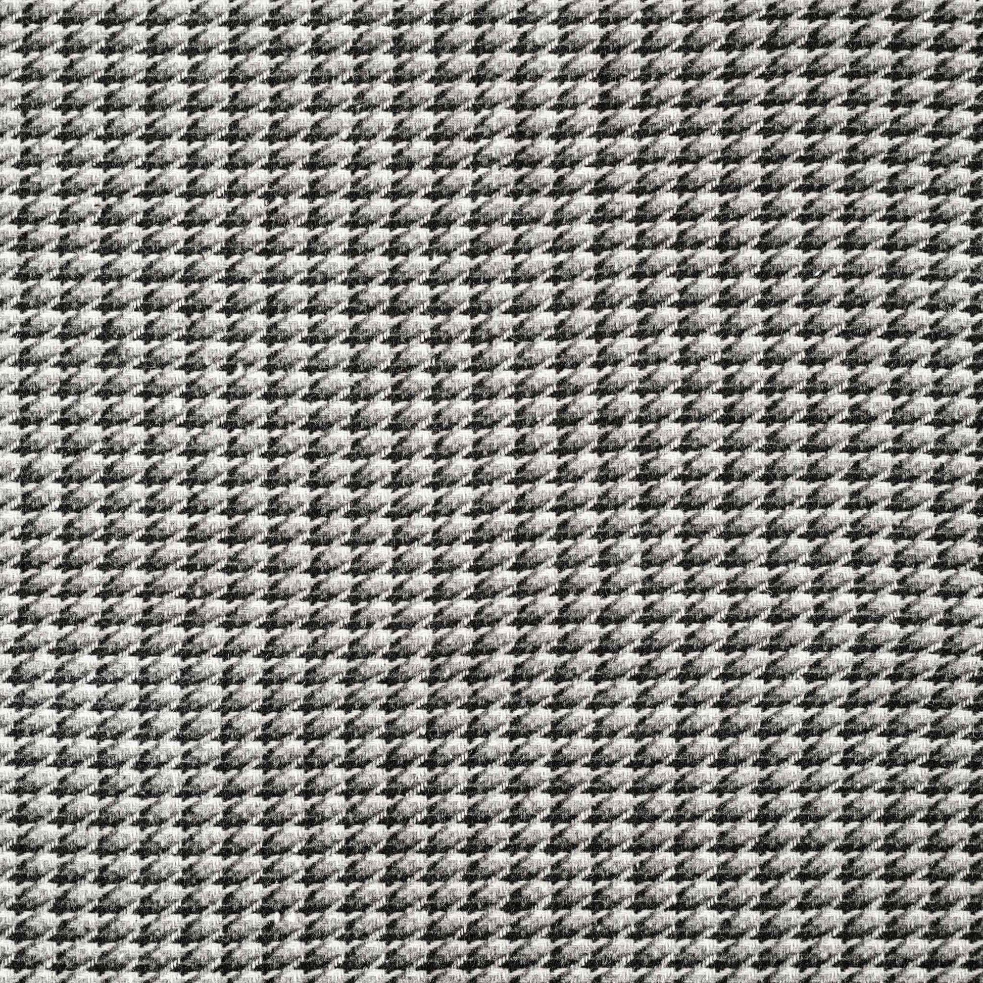 A black and grey checkered cushion cover featuring a houndstooth pattern with wide edges.