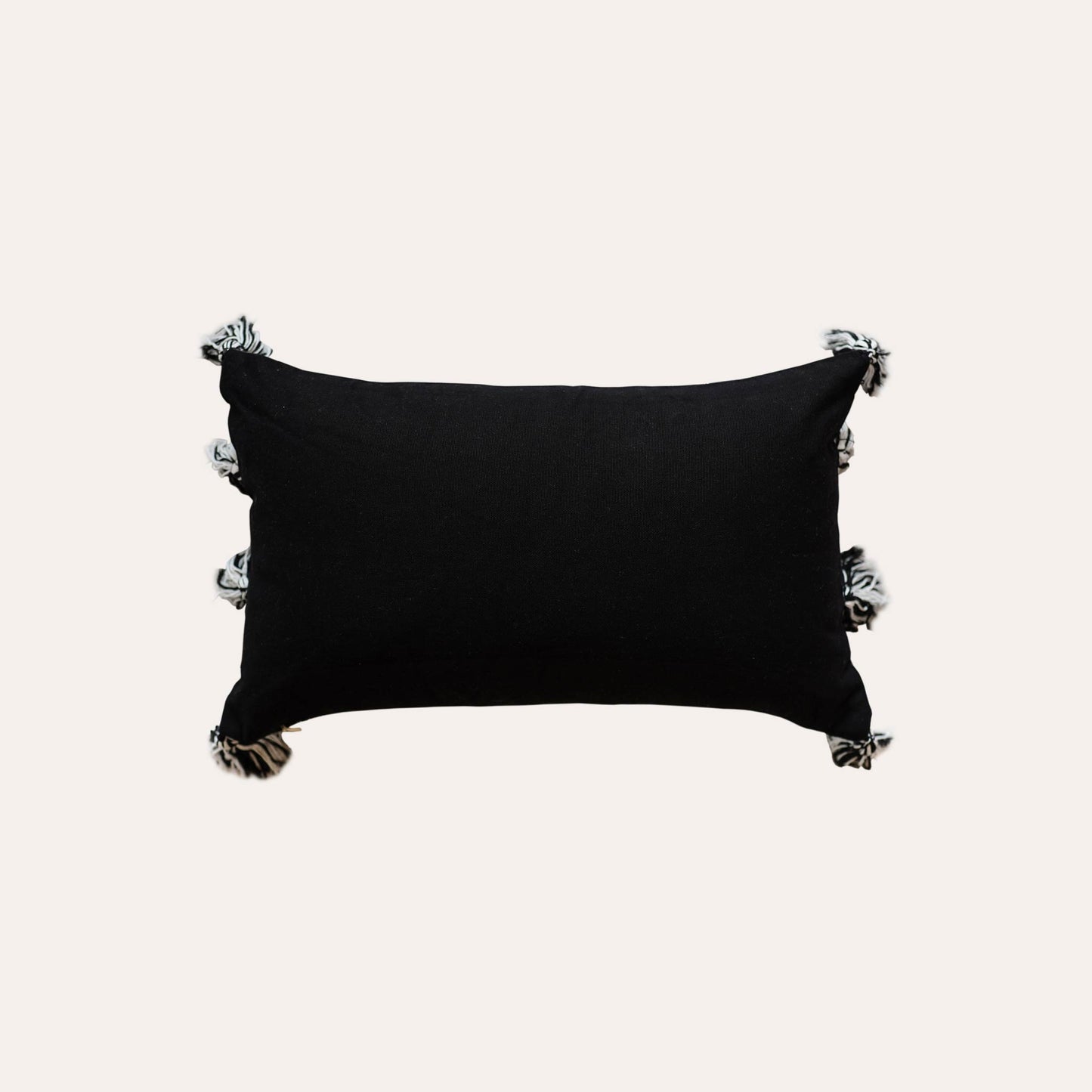 Bohemian white stripes printed on black cotton tassels lumbar cushion cover with black back.
