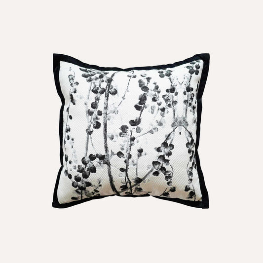 Delicate black and white vine jacquard with black wide edge cushion cover.