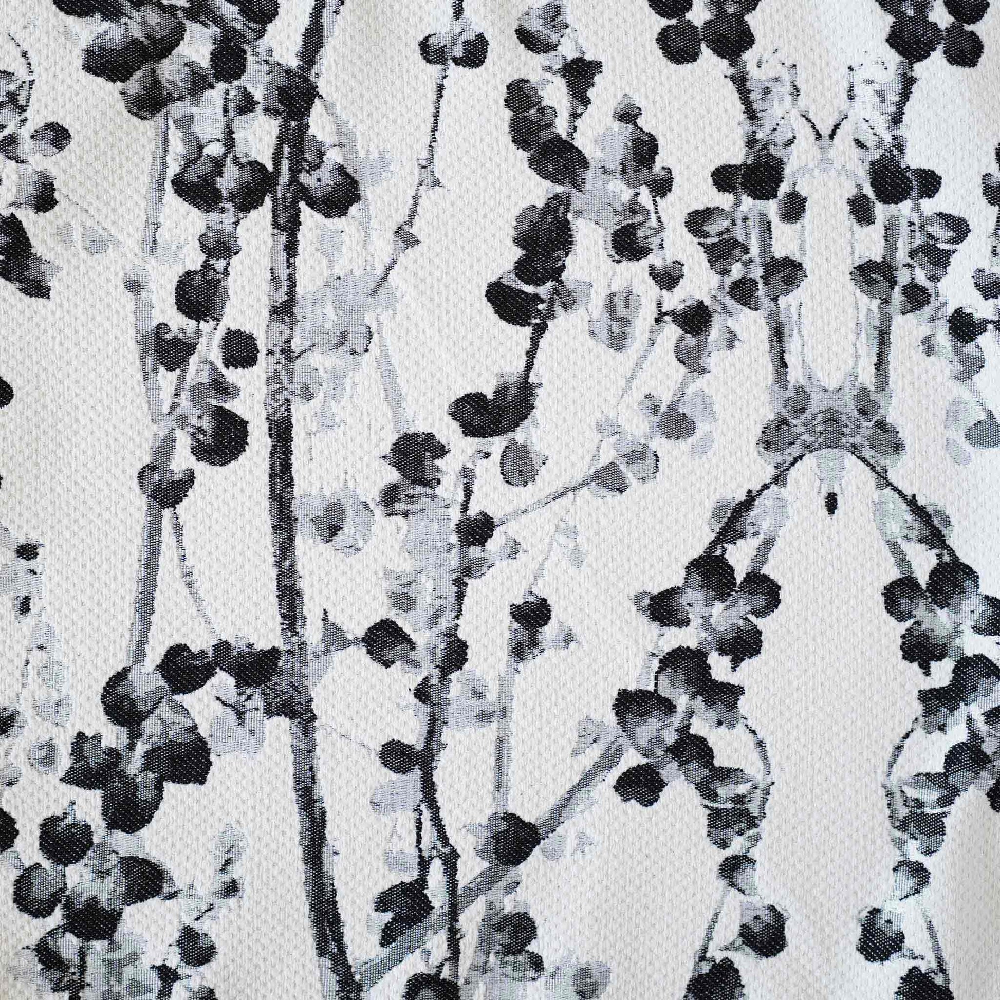 Delicate black and white vine jacquard with black wide edge cushion cover.