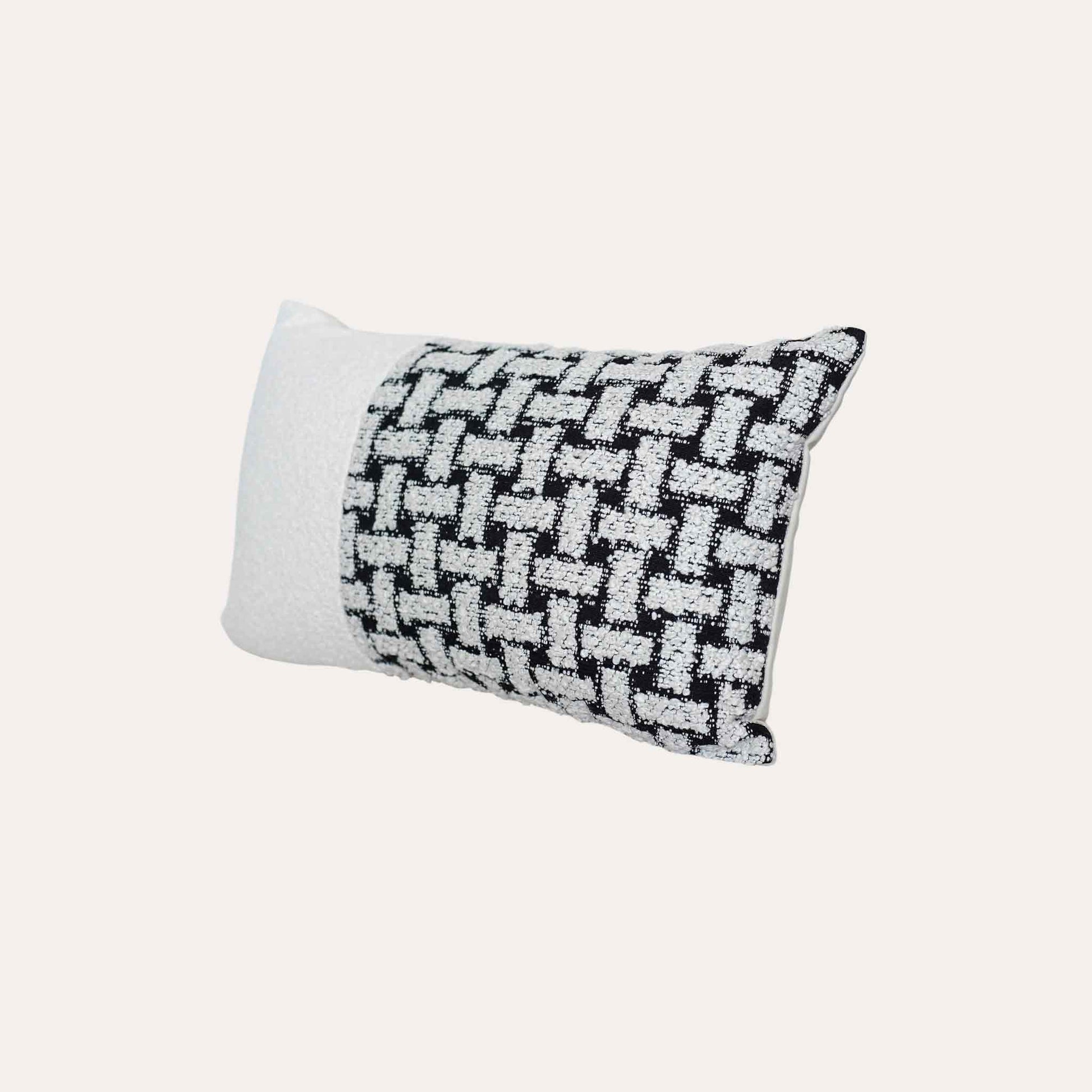 Black and white geometric brick chenille cushion cover.