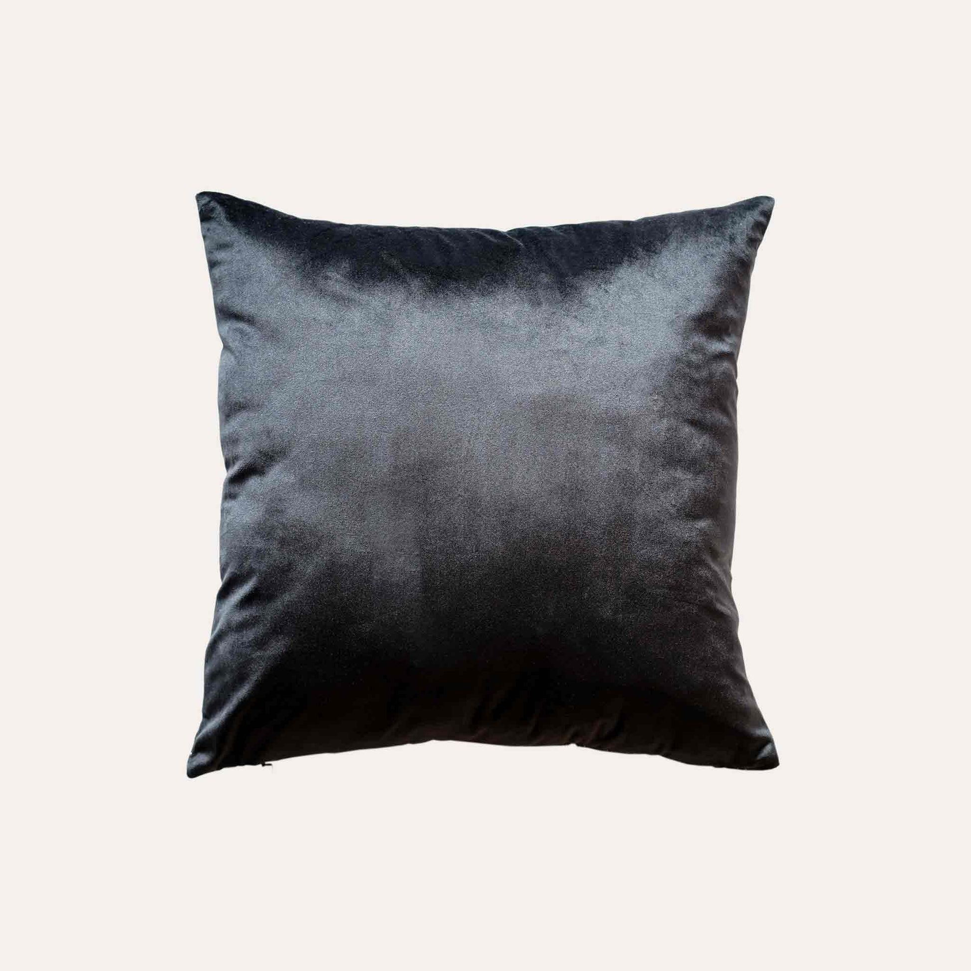 Black and white dots gradient cushion cover with black back.