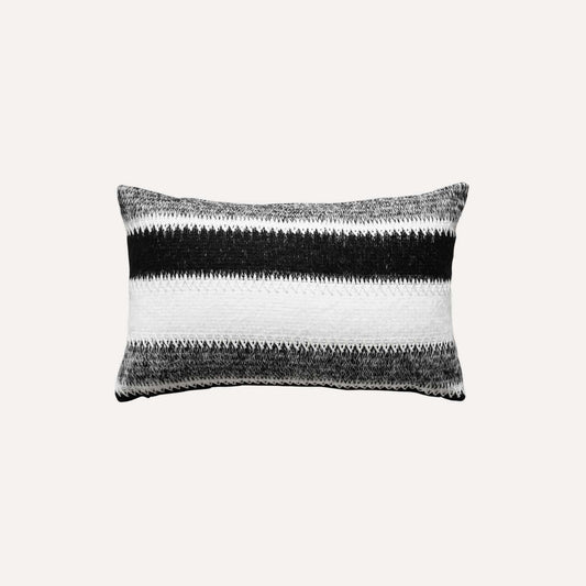 Black and white striped woolen decorative cushion cover.