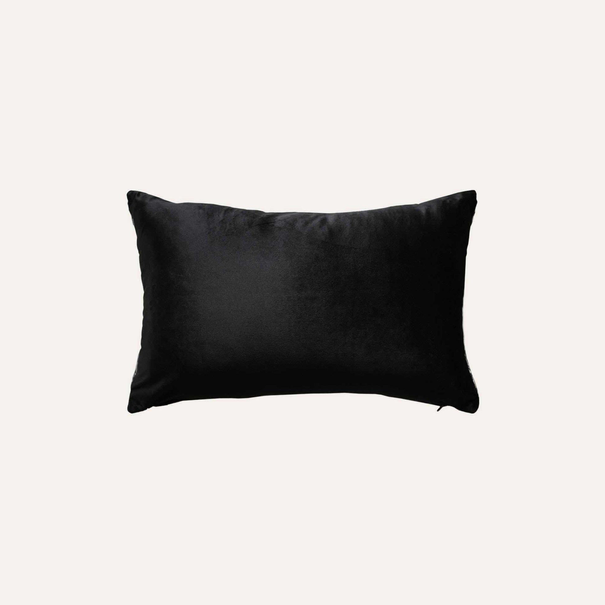 Black and white striped woolen decorative cushion cover with black back.