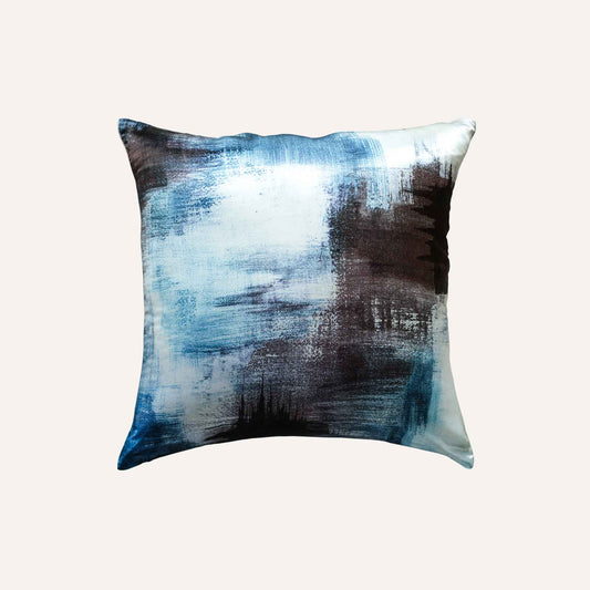 The blue and black cushion features an abstract painting design with vibrant colours and dynamic shapes, and the silk material is silky and noble.