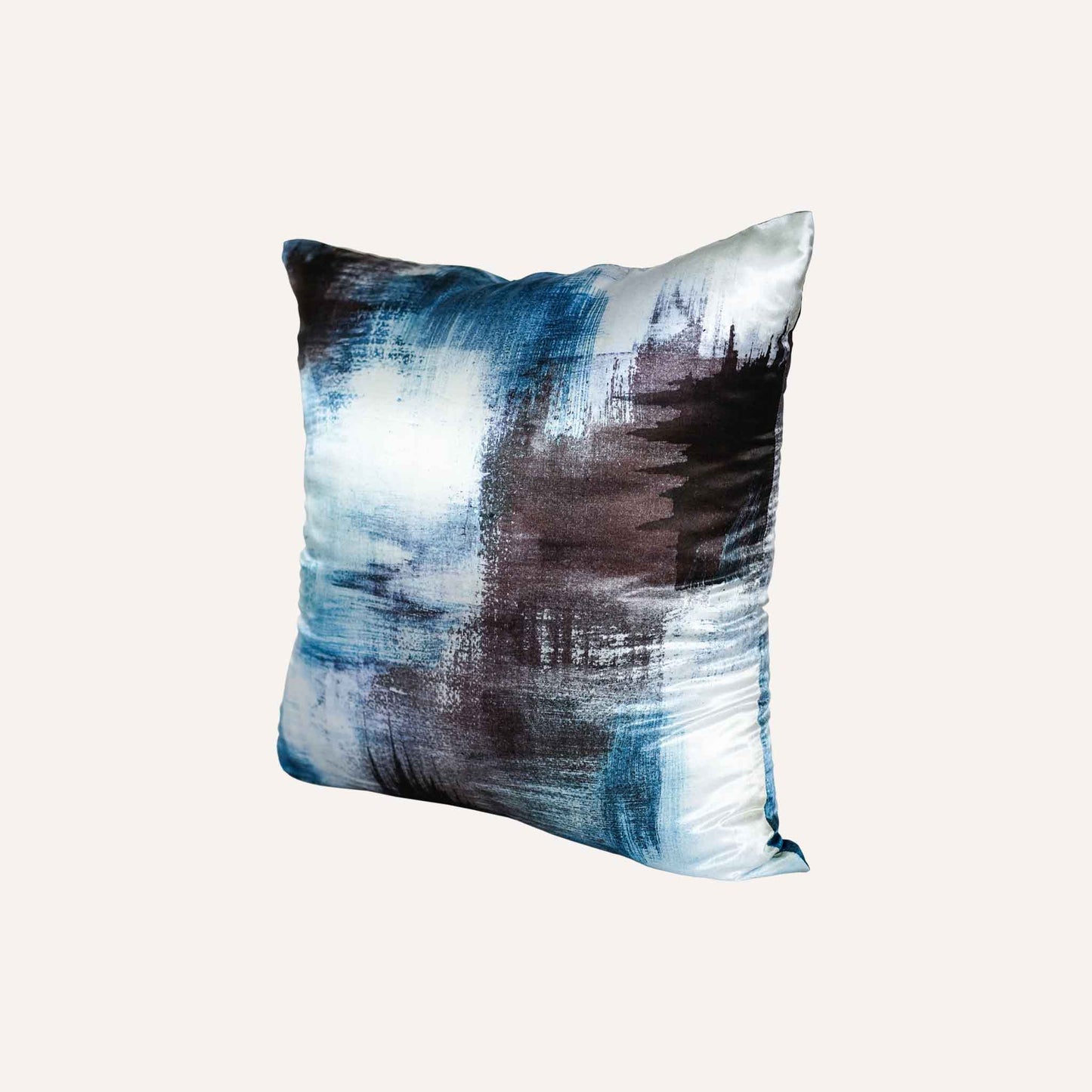 The blue and black cushion features an abstract painting design with vibrant colours and dynamic shapes, and the silk material is silky and noble.