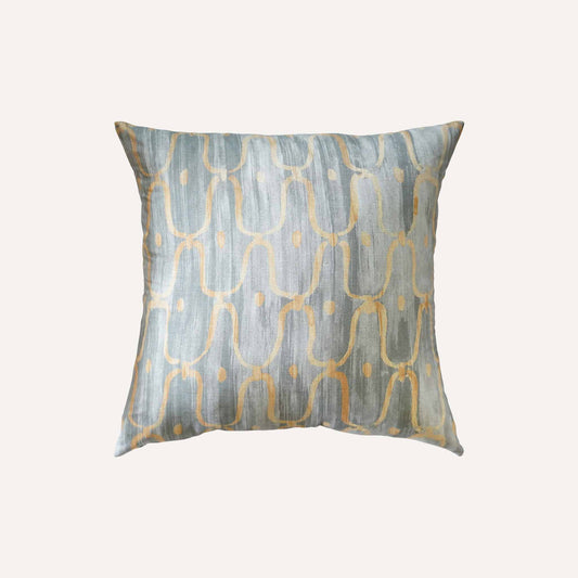 Decorative cushion in an elegant blue-grey and yellow pattern in a silk silky material.