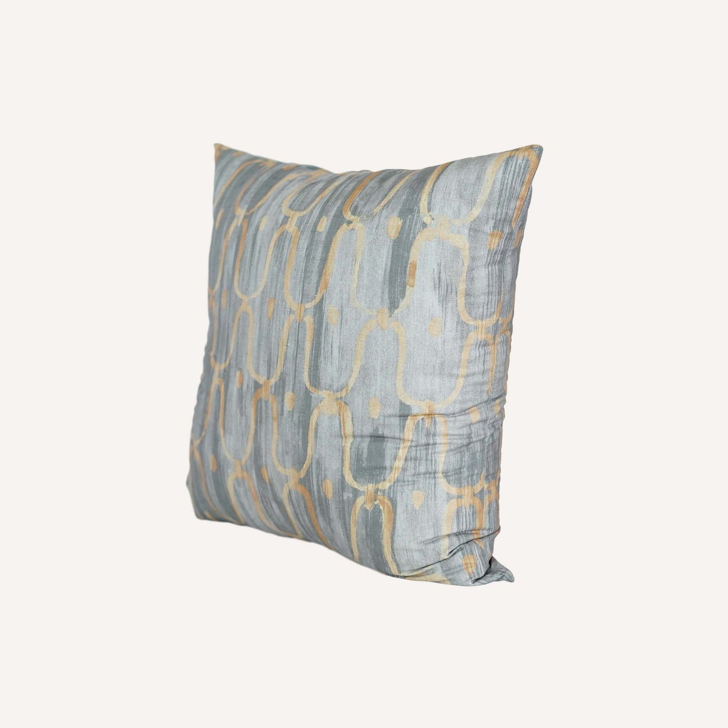 Decorative cushion in an elegant blue-grey and yellow pattern in a silk silky material.