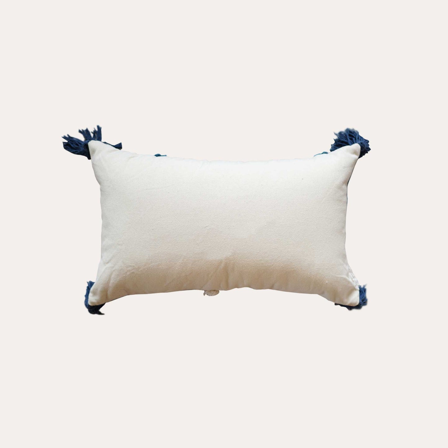 Blue beige tufted printed leaf pattern tassels lumbar cushion cover with white back.