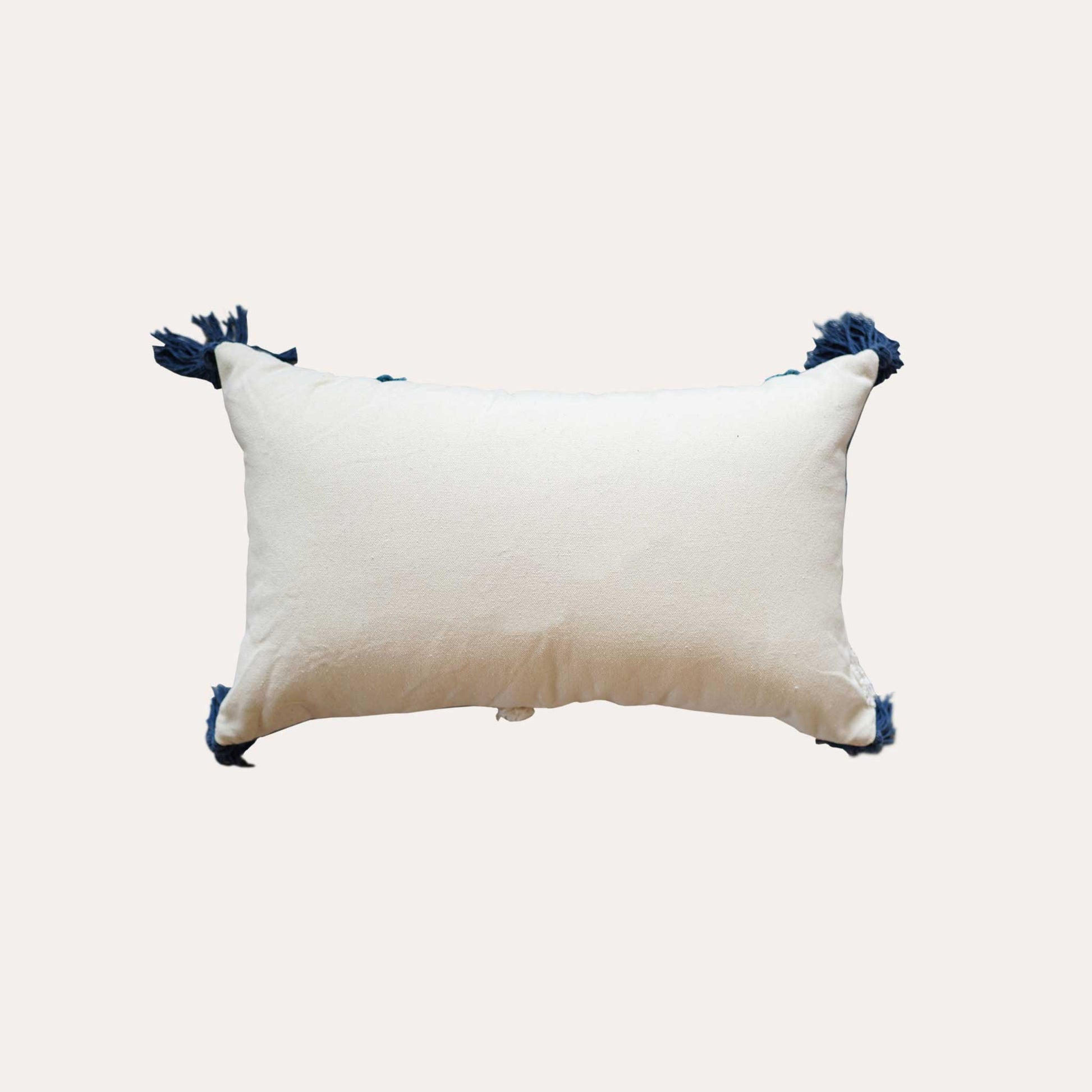 Blue beige tufted printed leaf pattern tassels lumbar cushion cover with white back.