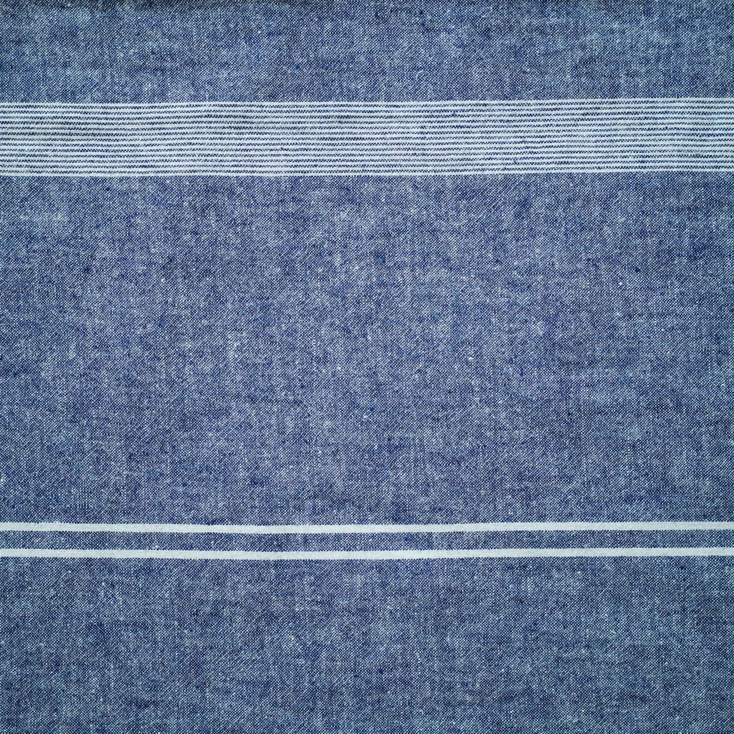 White stripe blue background lumbar cushion.