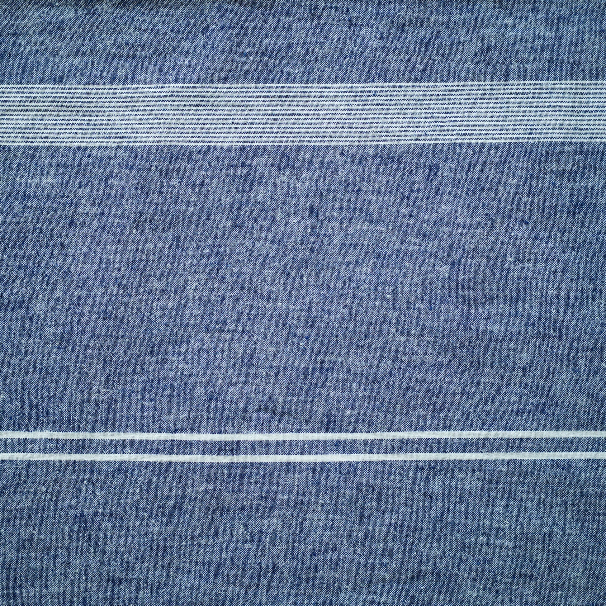 White stripe blue background lumbar cushion.