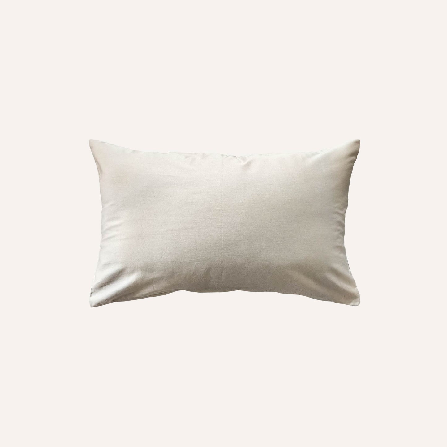 Solid beige base lumbar cushion back.