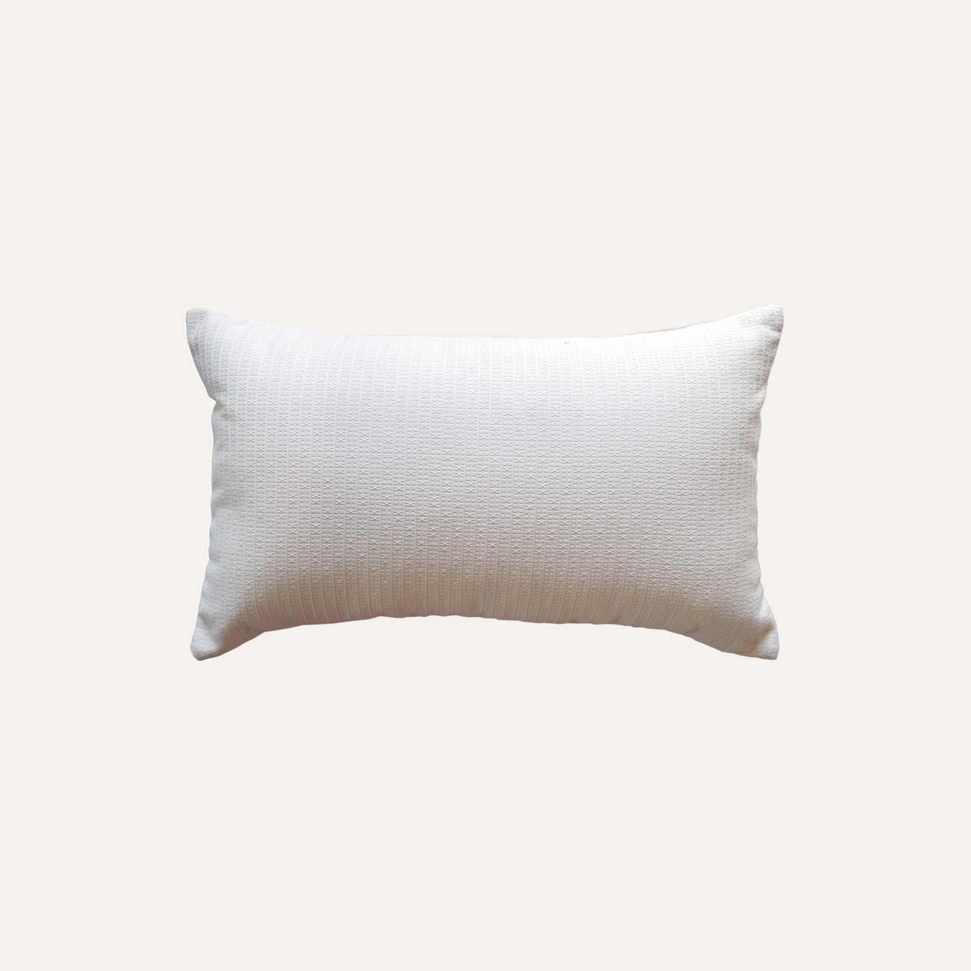 Brown and beige strips decorative lumbar cushion cover with white back.