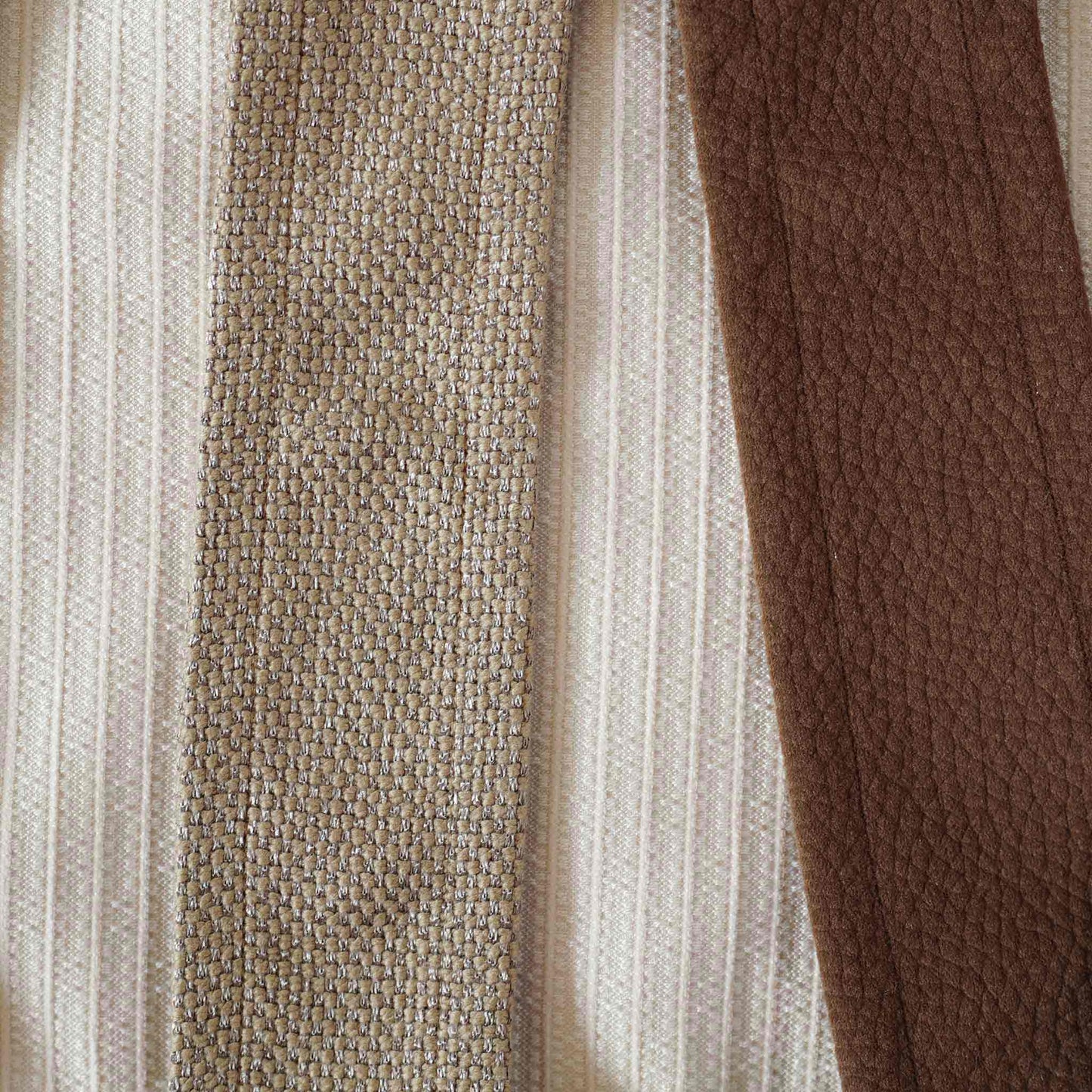 Brown and beige striped decorative lumbar cushion cover.
