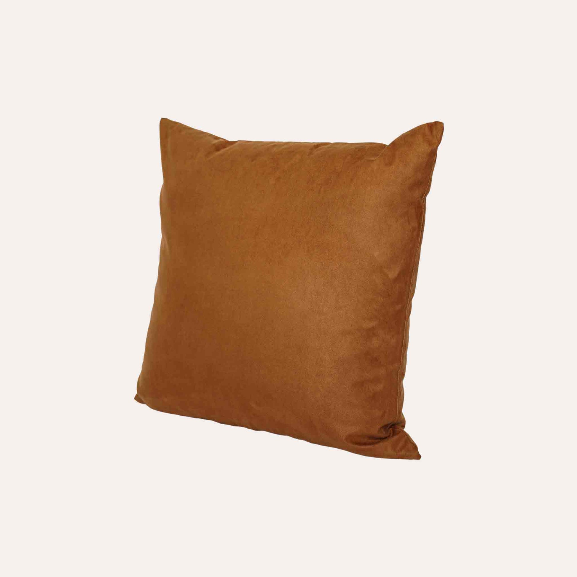 Soft texture and stylish design of solid tan suede cushion cover.
