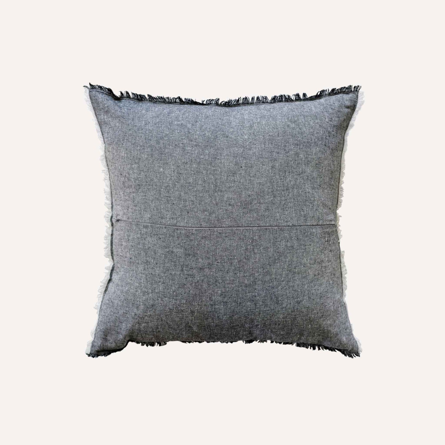 Dark Gray cushion with black fringes, adding a stylish touch to home decor.