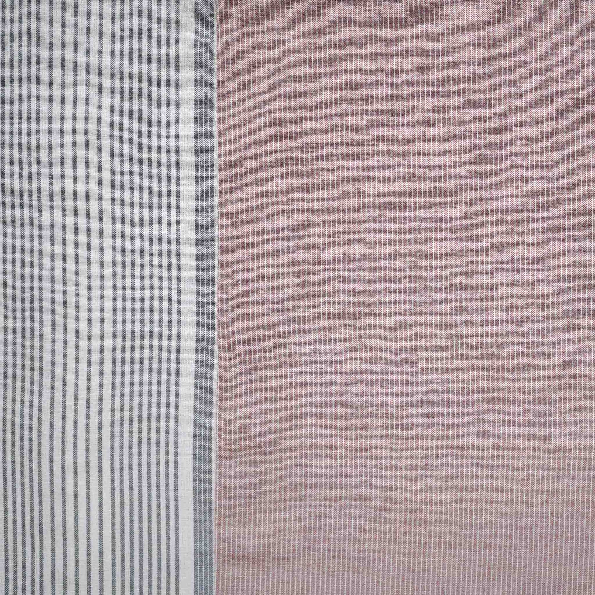 The coral red, white and grey stripe asymmetric cushion.