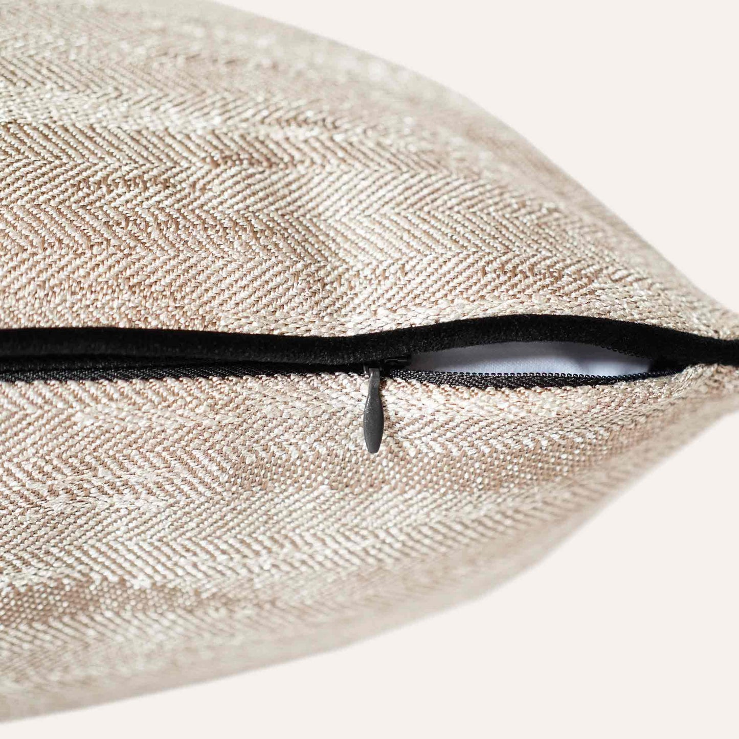 Beige cushion cover with a chic black border, made from cotton linen textured fabric with invisible zipper.