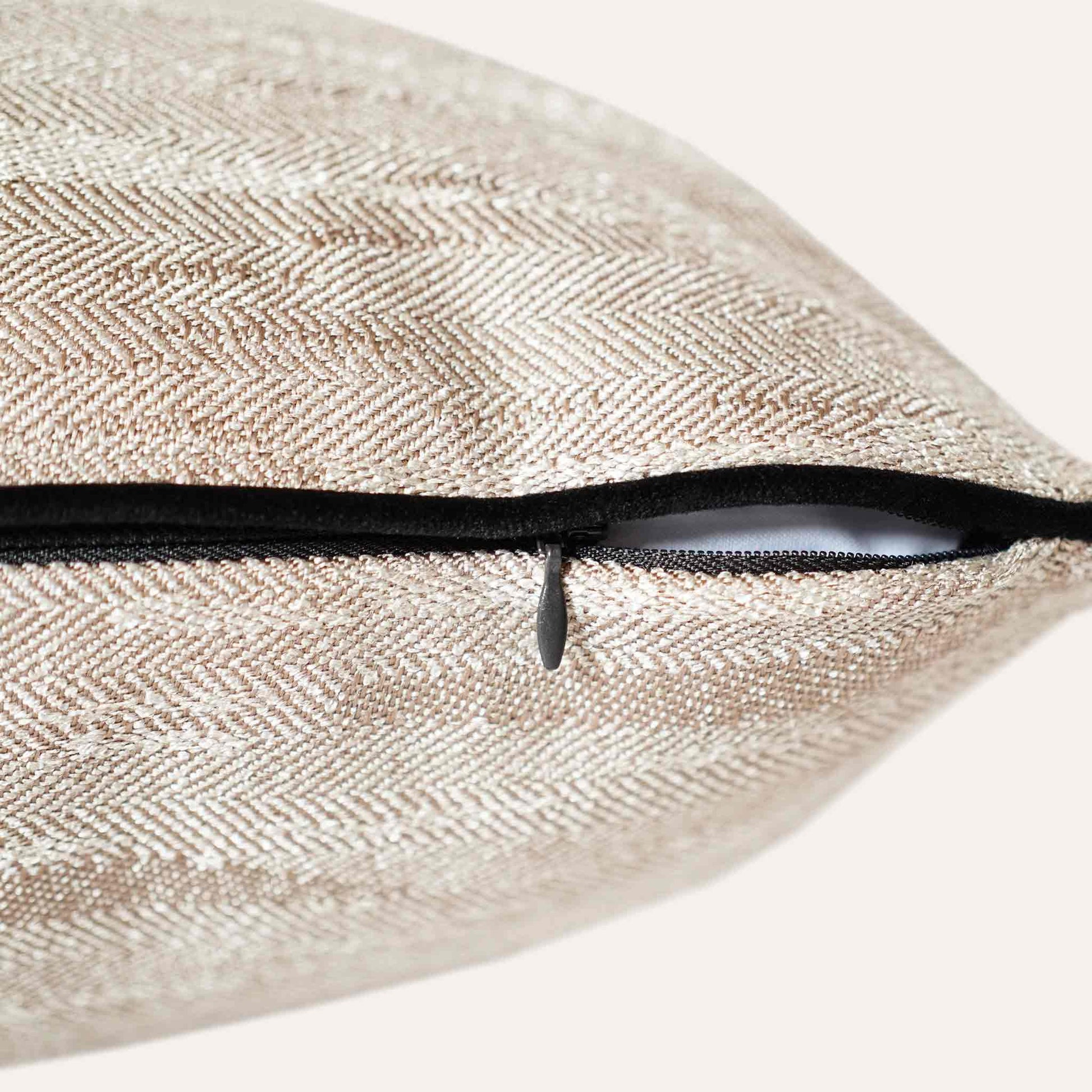 Beige cushion cover with a chic black border, made from cotton linen textured fabric with invisible zipper.