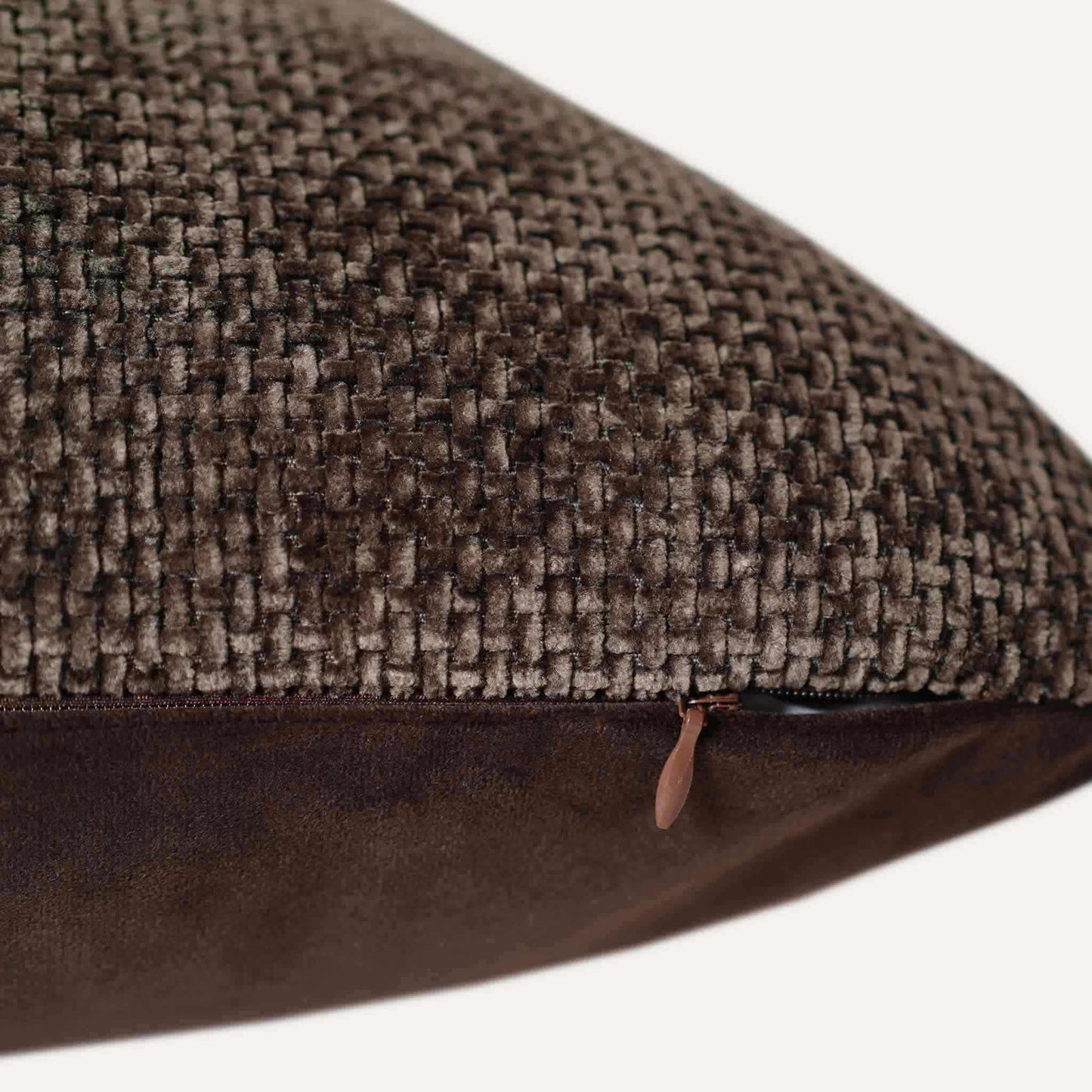 Cushion cover in a rich dark brown hue, expertly made from intricately woven chenille fabric with invisible zipper.
