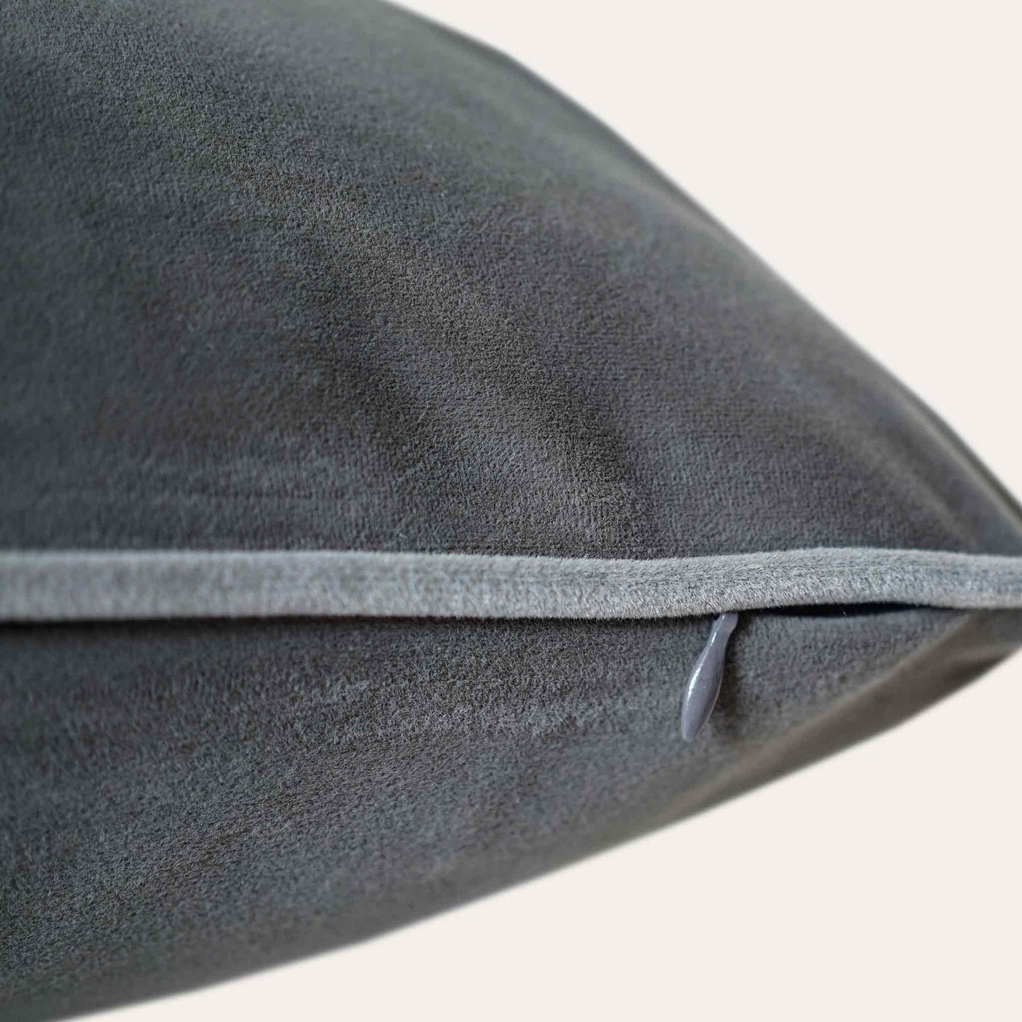 Soft dark grey velvet with stylish piping cushion cover with invisible zipper.