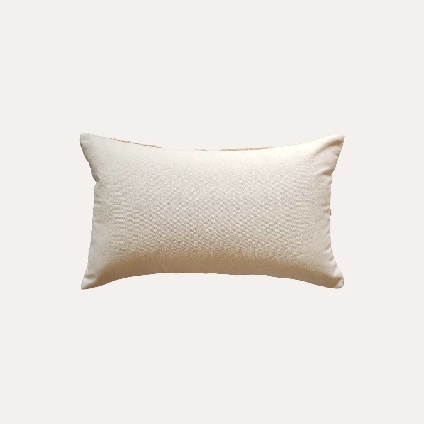 Earth-yellow embroidered diamond pattern cotton cushion cover with white back.