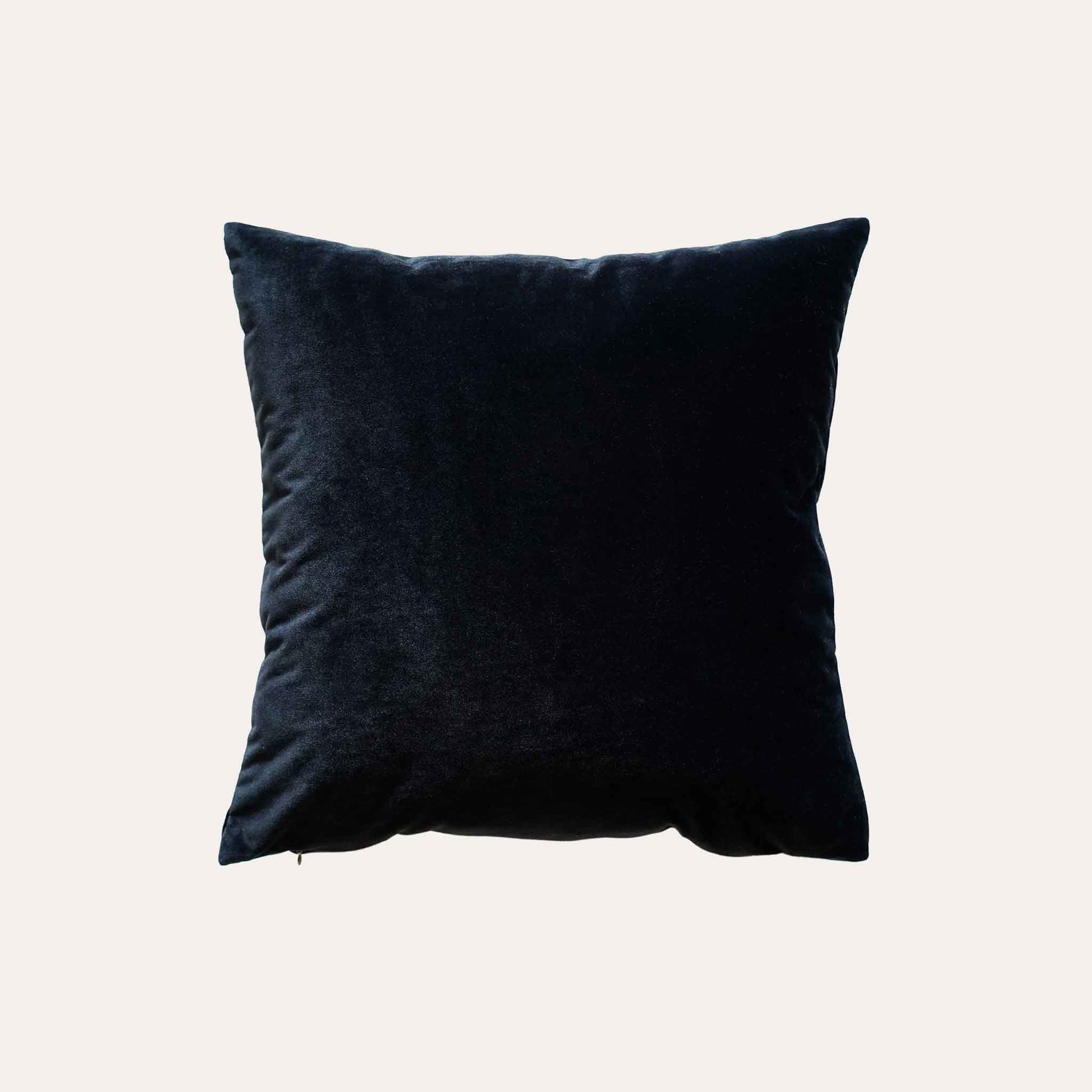 Elegant gold bamboo embroidered cushion cover with black background.