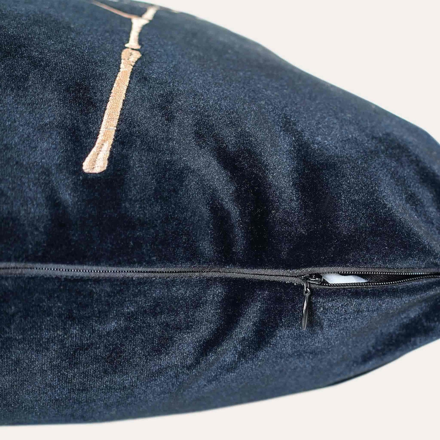 Elegant gold bamboo embroidered black cushion cover with invisible zipper.