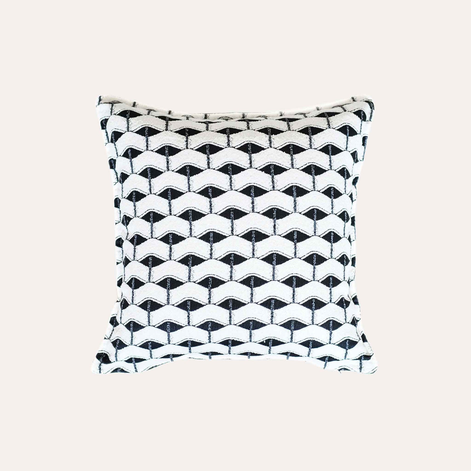 Chic black and white geometric cushion cover.