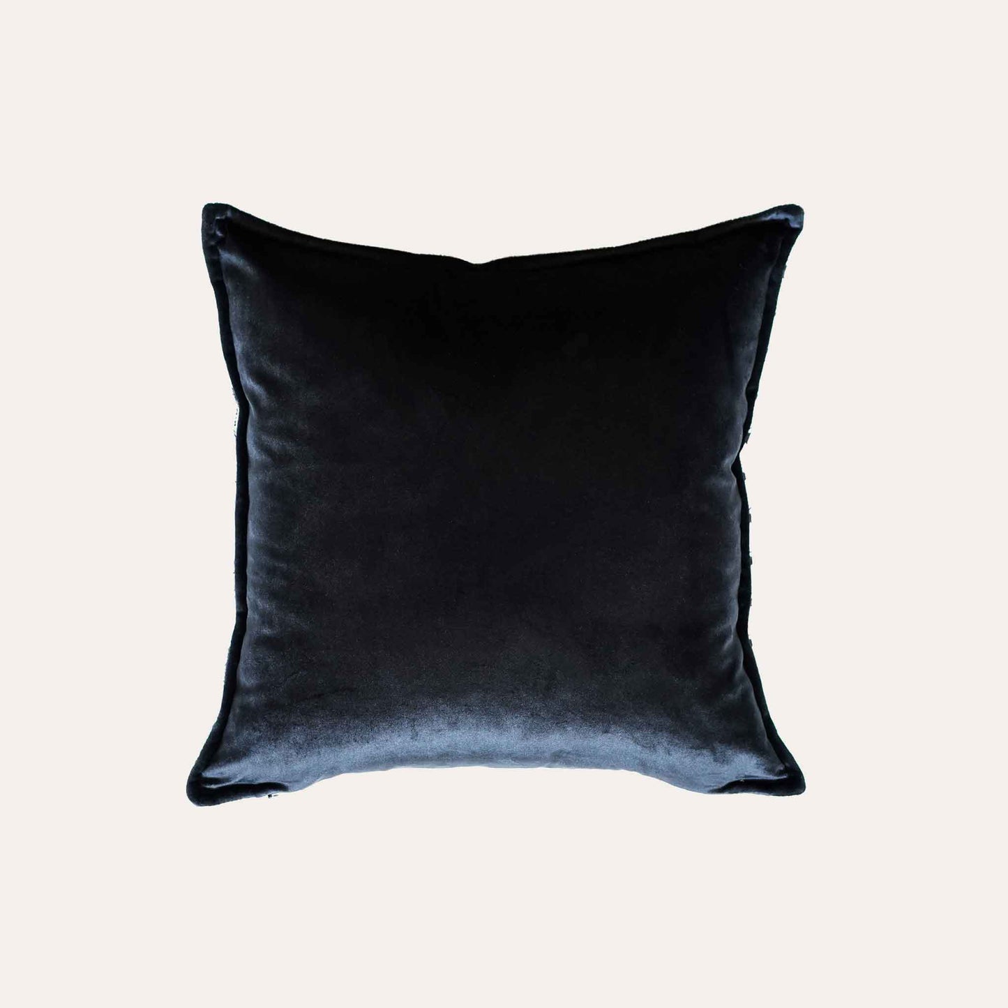 Chic black and white geometric cushion cover with black back.