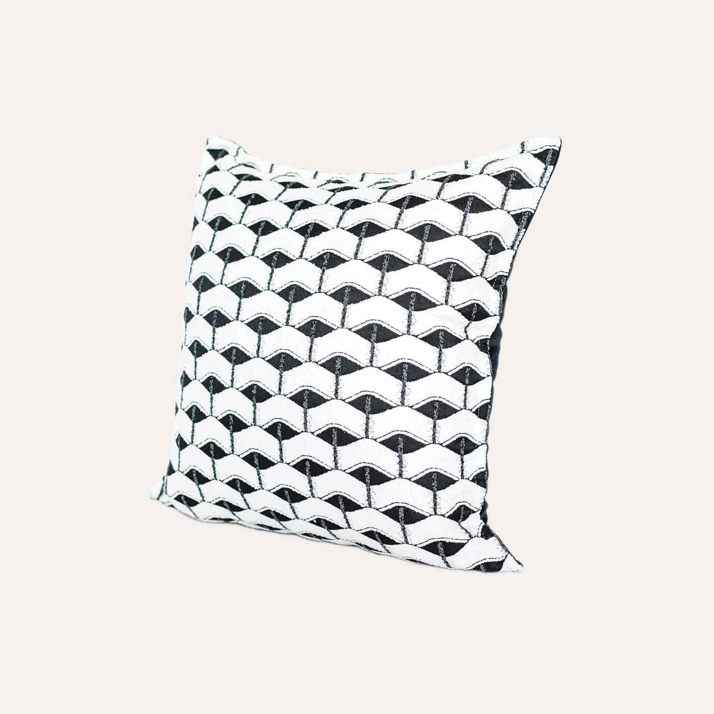 Chic black and white geometric cushion cover.